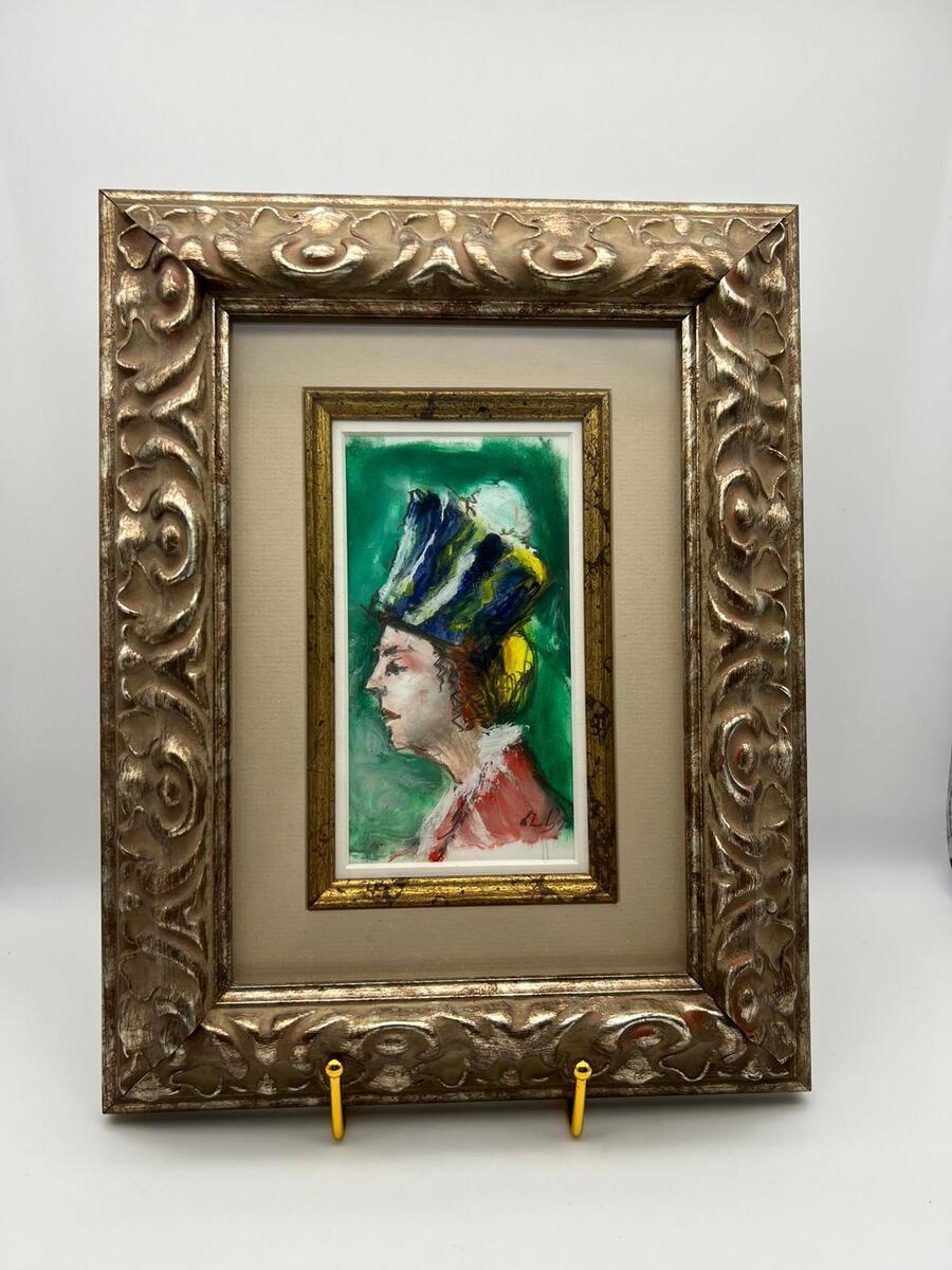 Portret van een vrouw met blauwe hoed 