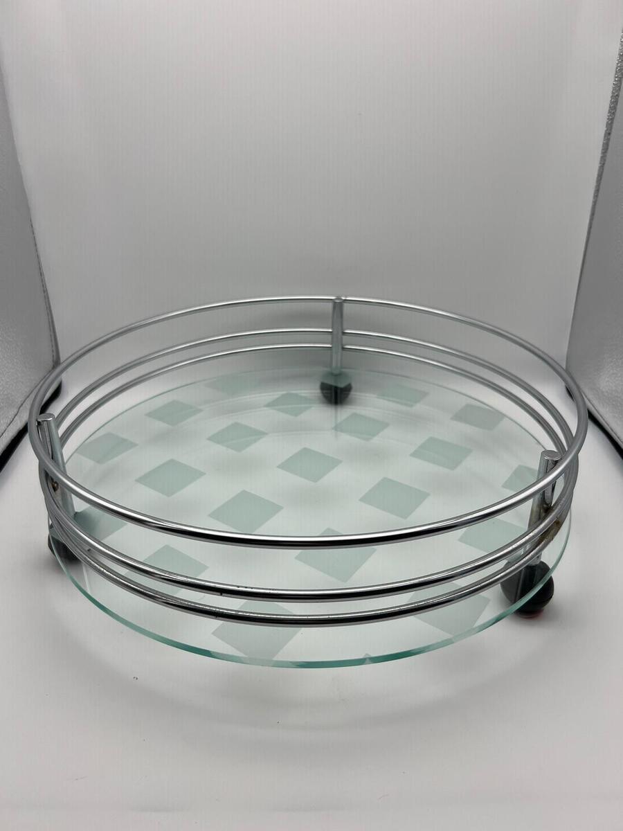 Rond dienblad met glazen bodem en verchroomde metalen rand 
