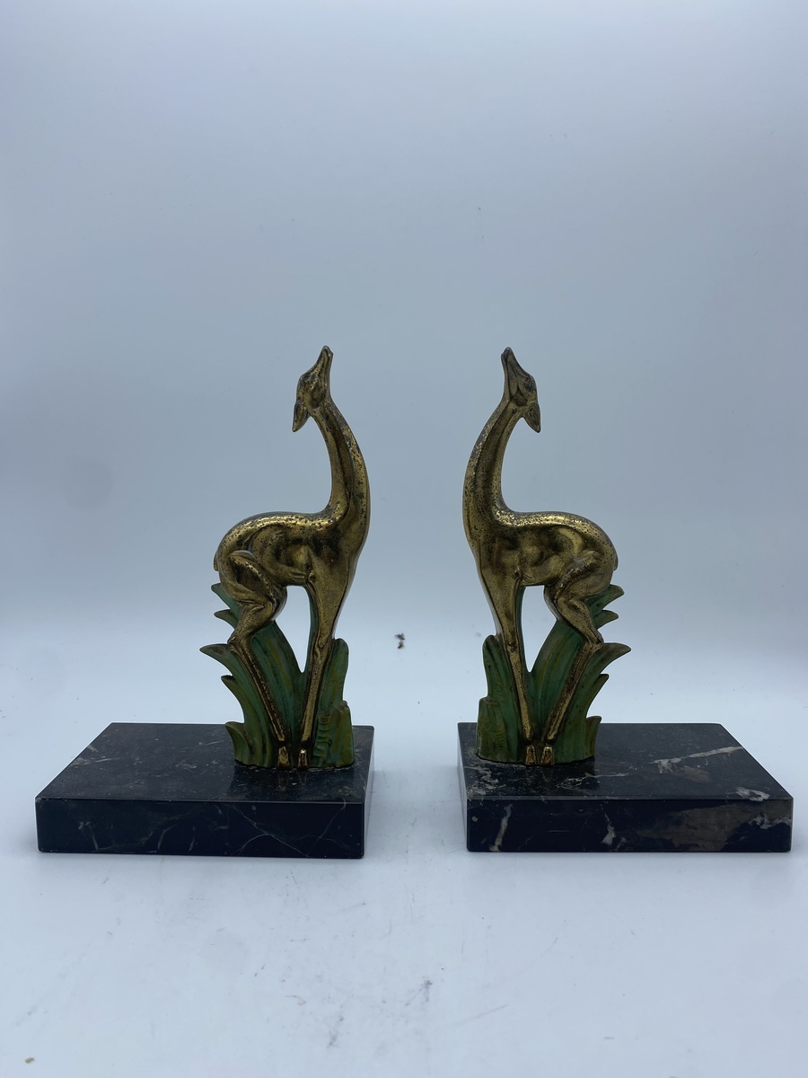 Art Deco bronzen beeldpaar van giraffen op marmeren voet